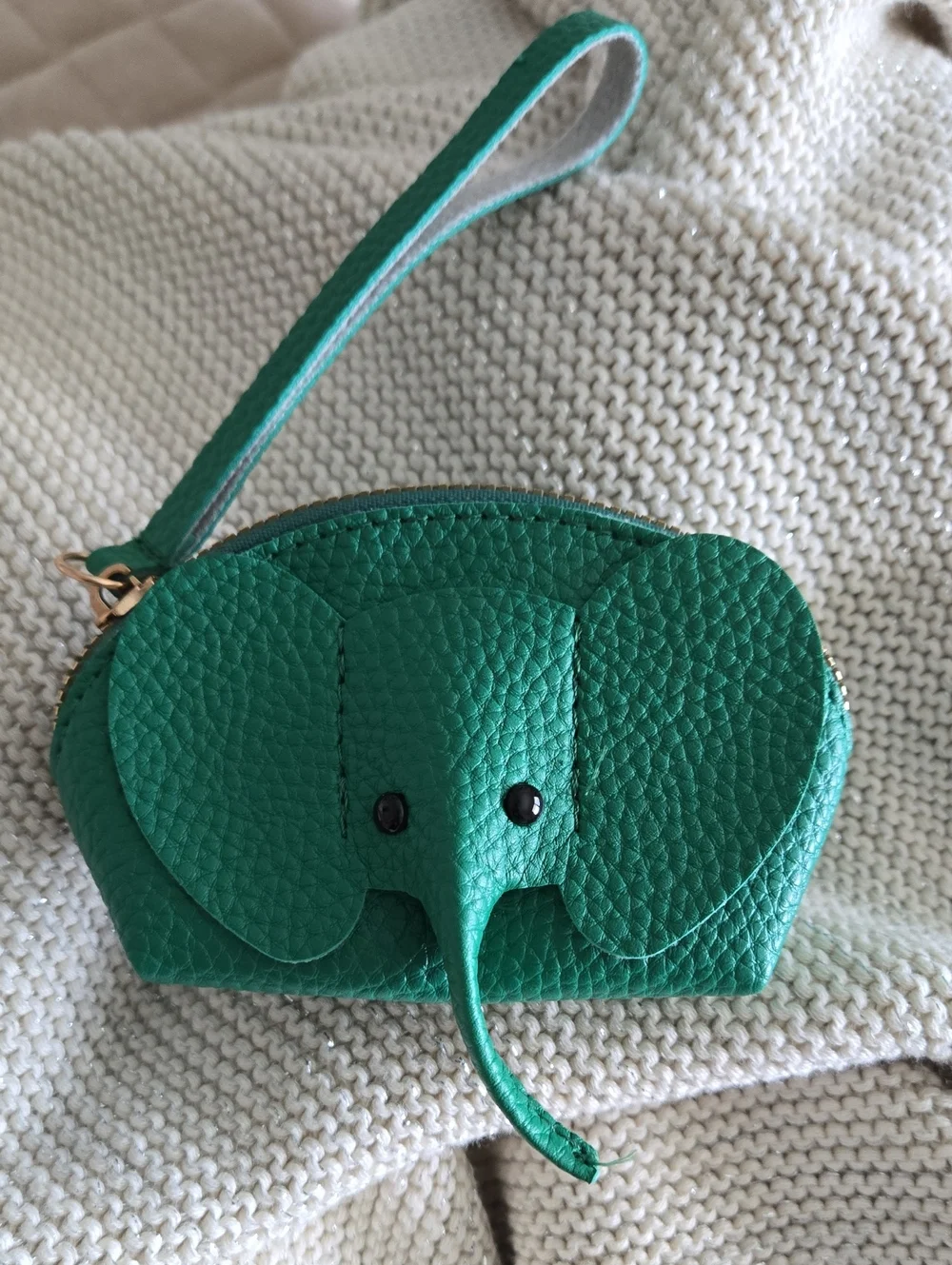 Off White Elephant wristlet/coin.purse is back in stock. Zipper closure -